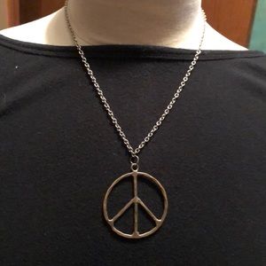 Gold peace necklace